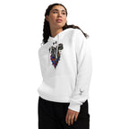 Person wearing a white Under Armour hoodie with plush fleece, chest graphic, and embroidered sleeve detail.